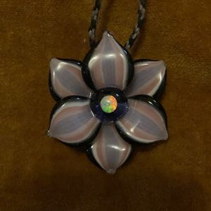 Ethiopian opal placed inside a glass flower